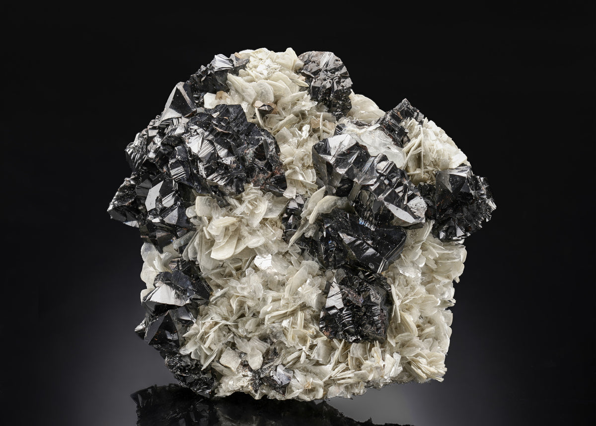 CASSITERITE with MUSCOVITE