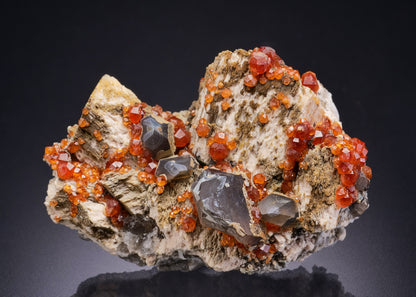 SPESSARTINE on MICROCLINE with Smoky QUARTZ