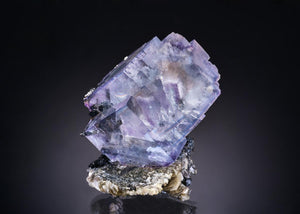 FLUORITE with FERBERITE, QUARTZ, ARSENOPYRITE and MUSCOVITE
