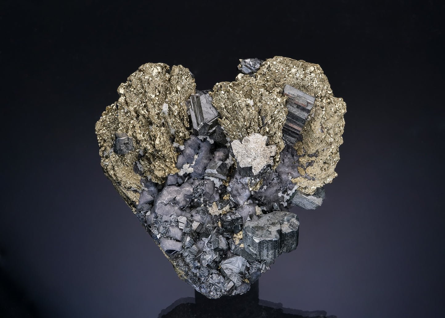 BOURNONITE with GALENA and SPHALERITE on PYRITE ps. after PYRRHOTITE